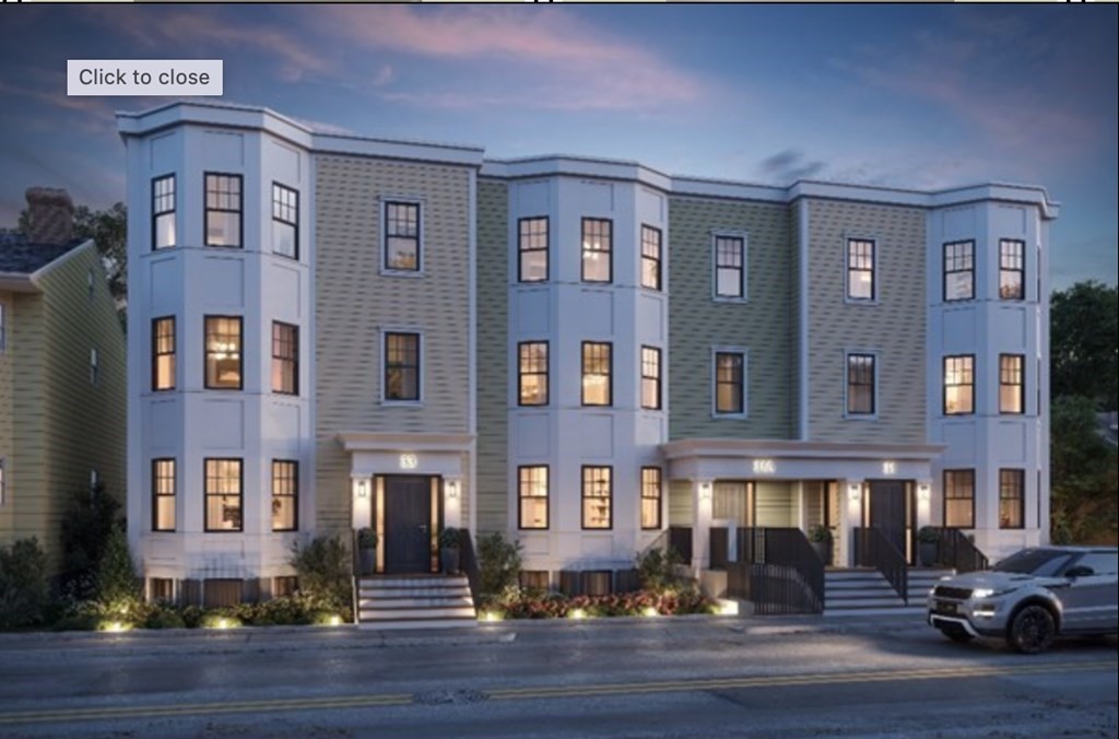 31 Boardman Street, Unit 1 Boston, MA 02128 - Photo 1 of 8 a view of a brick building with many windows