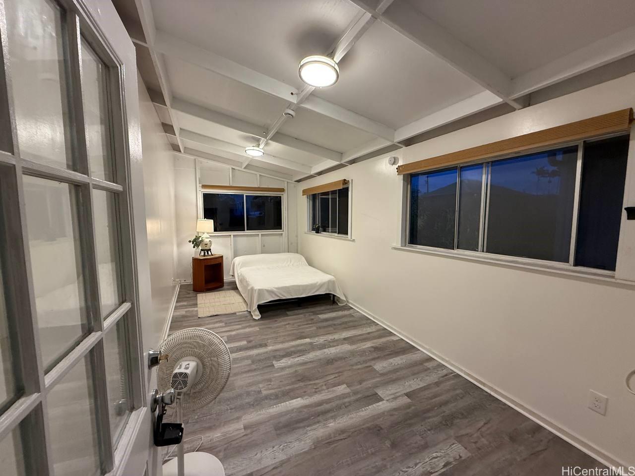 82 Hoku Street, Unit D Hilo, HI 96720 - Photo 13 of 15 a living room with furniture