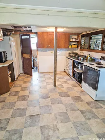 a view of a kitchen with a sink