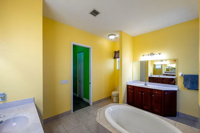 $619,900 | 3820 Southwest Cheribon Street, Port St. Lucie, FL 34953