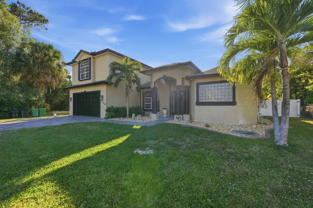 $619,900 | 3820 Southwest Cheribon Street, Port St. Lucie, FL 34953