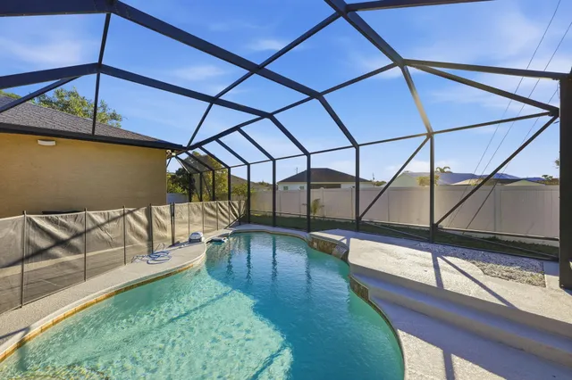 $619,900 | 3820 Southwest Cheribon Street, Port St. Lucie, FL 34953