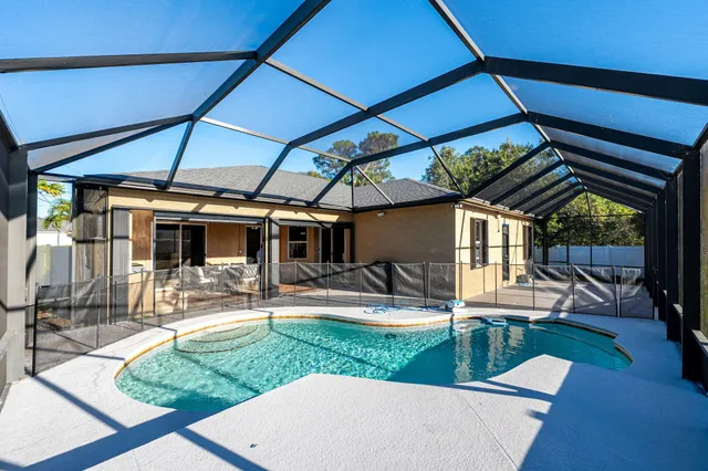 $619,900 | 3820 Southwest Cheribon Street, Port St. Lucie, FL 34953