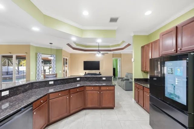 $619,900 | 3820 Southwest Cheribon Street, Port St. Lucie, FL 34953