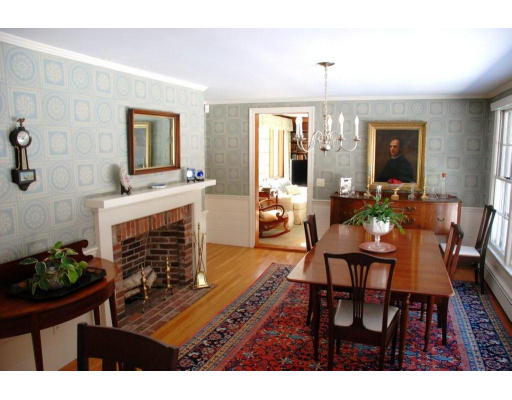 94 Sears Road Wayland, MA 01778 - Photo 3 of 6 a living room with furniture a fireplace and a flat screen tv
