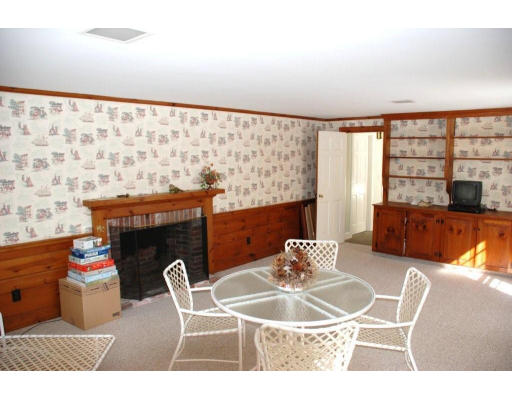 94 Sears Road Wayland, MA 01778 - Photo 6 of 6 a dining room with furniture and wooden floor