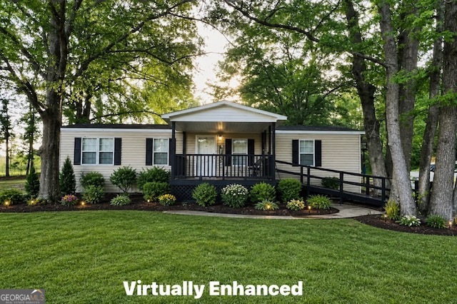 3195 Henderson Grove Road Sandersville, GA 31082 - Photo 2 of 50 a front view of a house with a garden