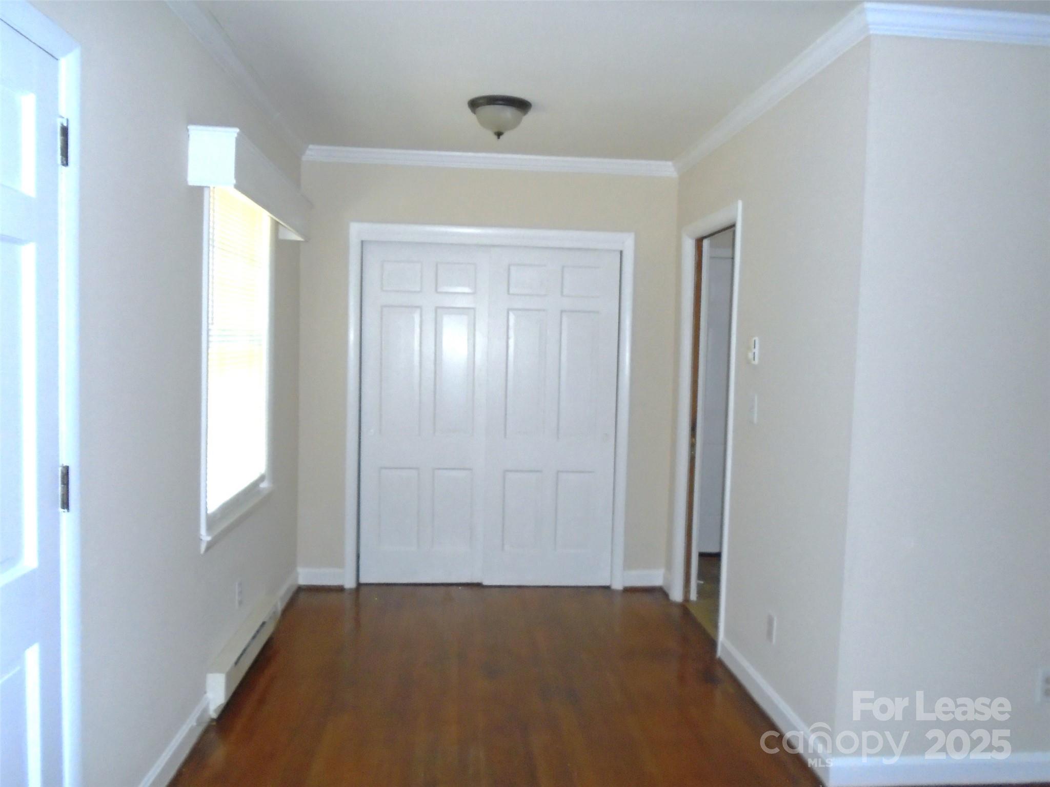 4227 Walker Road, Unit 1 Charlotte, NC 28211 - Photo 5 of 9 a view of an empty room and window