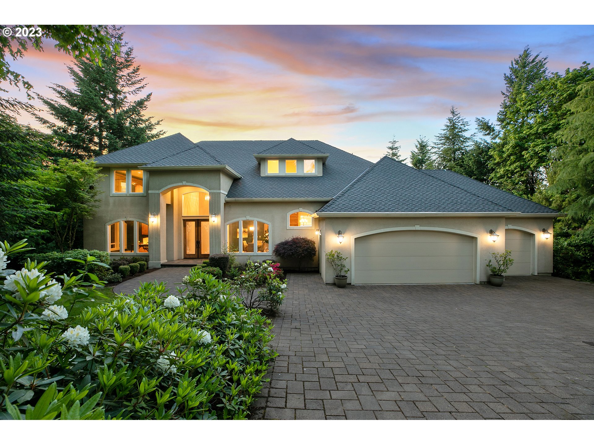 17505 Southwest Parrett Mountain Road Sherwood, OR 97140 - Photo 1 of 48 a front view of a house with garden