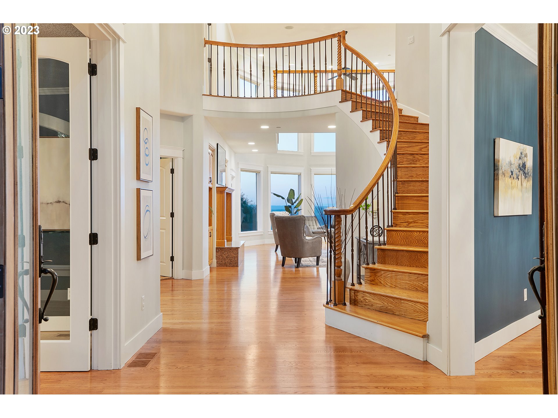 17505 Southwest Parrett Mountain Road Sherwood, OR 97140 - Photo 5 of 48 a view of a hallway with wooden floor and entryway