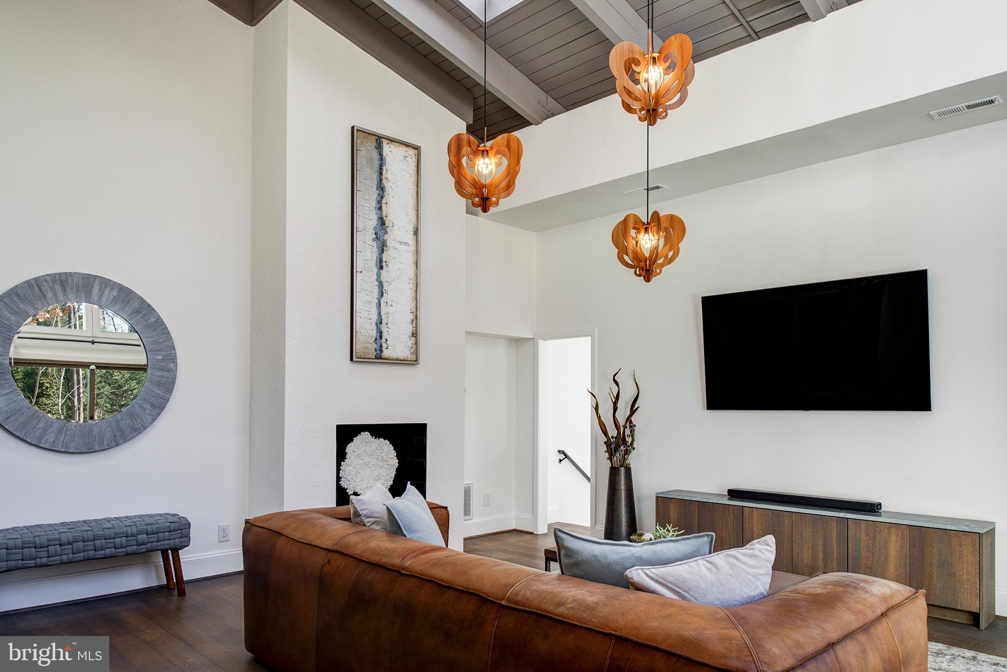 11103 Wedge Drive Reston, VA 20190 - Photo 12 of 41 Family room with soaring wood-burning fireplace!