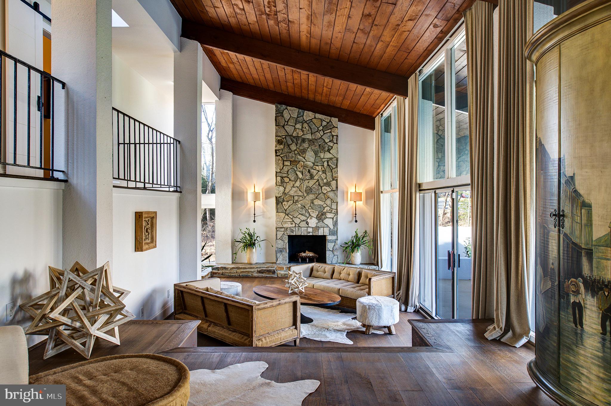 11103 Wedge Drive Reston, VA 20190 - Photo 18 of 41 Formal living room with 2 story stone fireplace!!