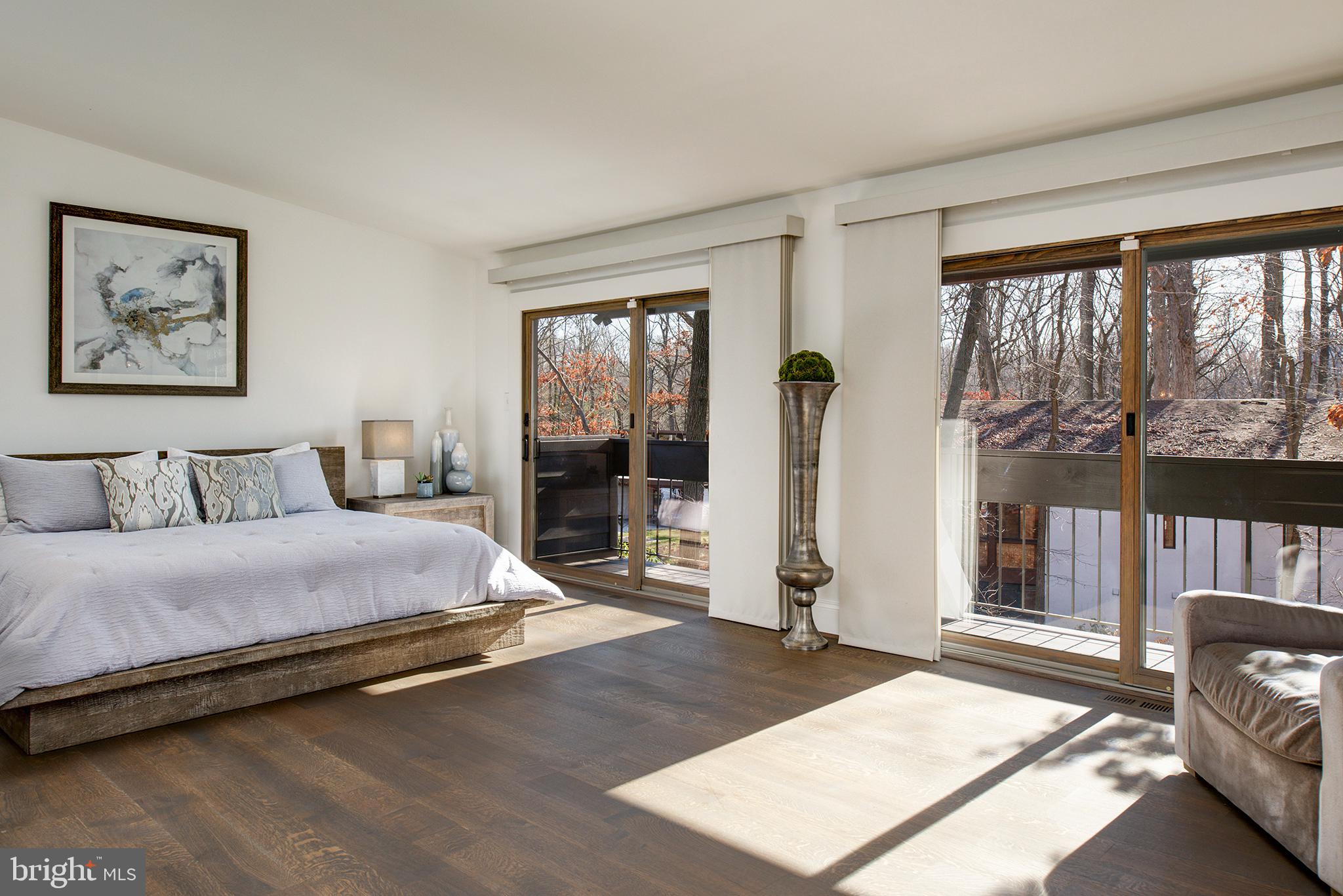 11103 Wedge Drive Reston, VA 20190 - Photo 25 of 41 Master bedroom with sunny balcony!
