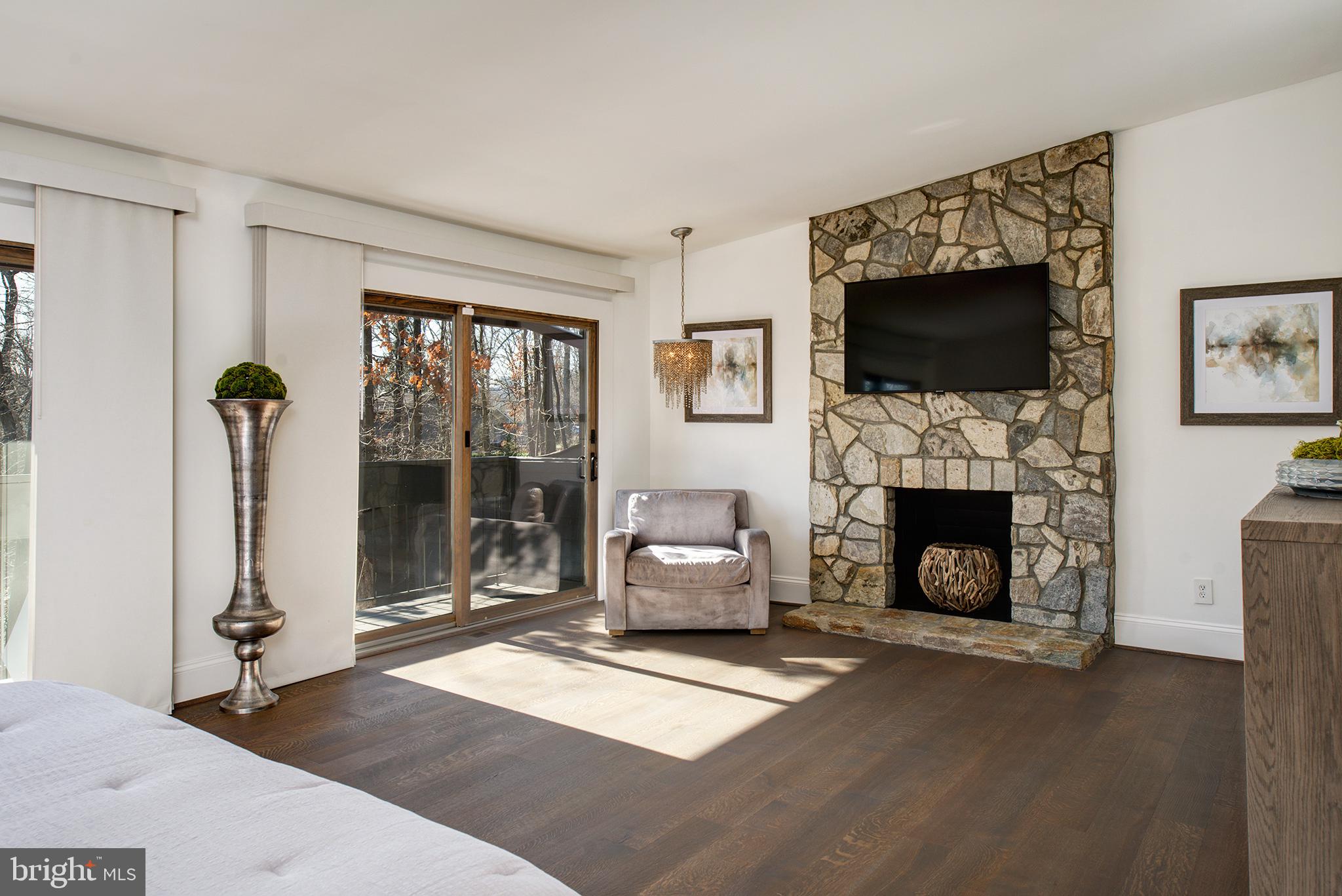 11103 Wedge Drive Reston, VA 20190 - Photo 26 of 41 Master bedroom stone wood-burning fireplace!