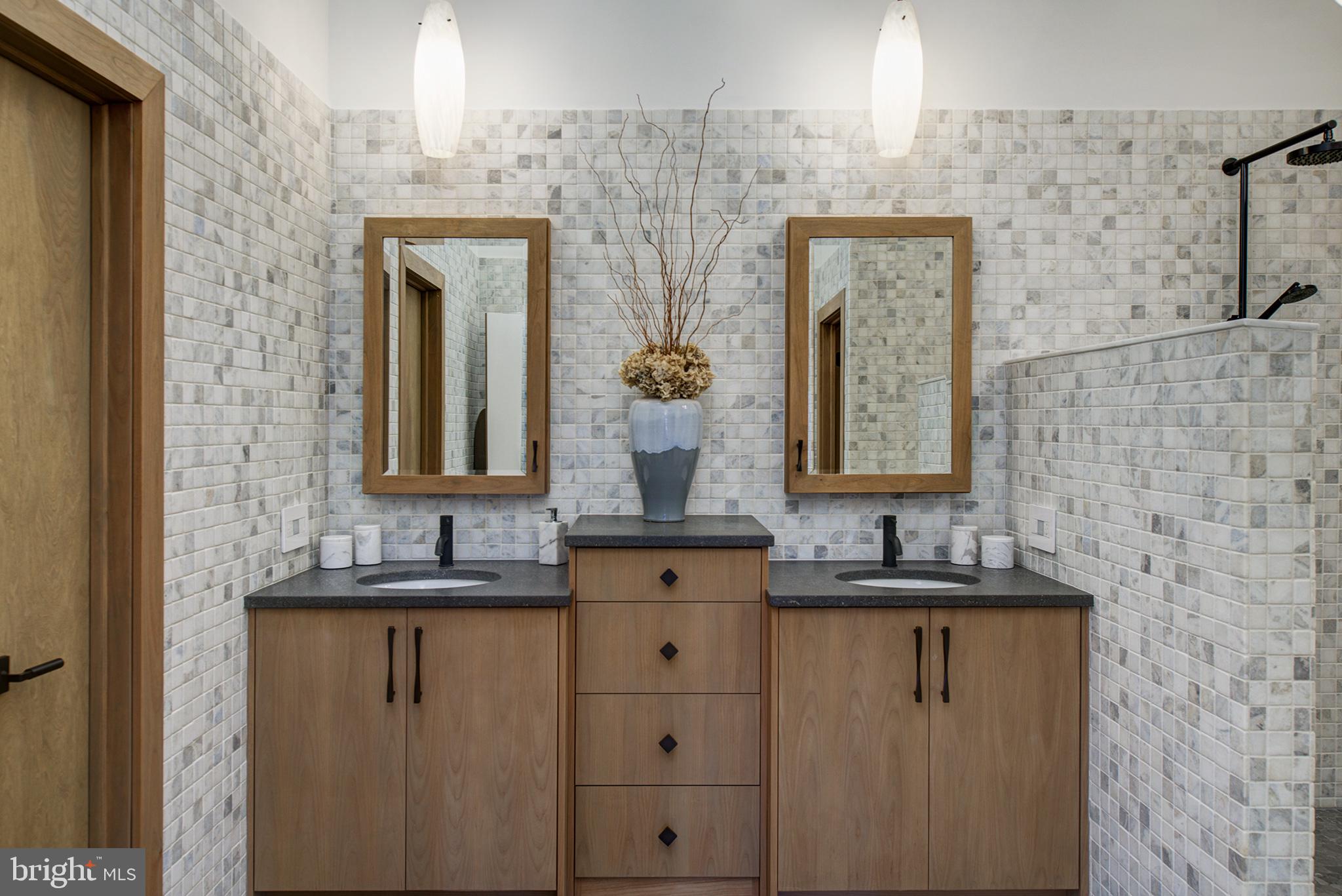11103 Wedge Drive Reston, VA 20190 - Photo 27 of 41 Master bathroom with marble wall tile