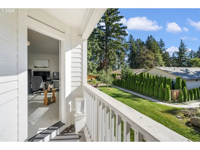 a front view of a house with wooden stairs