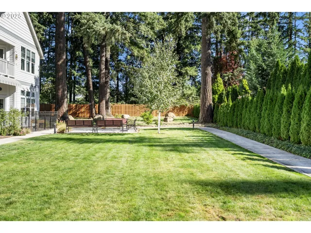 a view of a park with sitting area