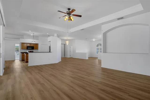 a living room with furniture and windows