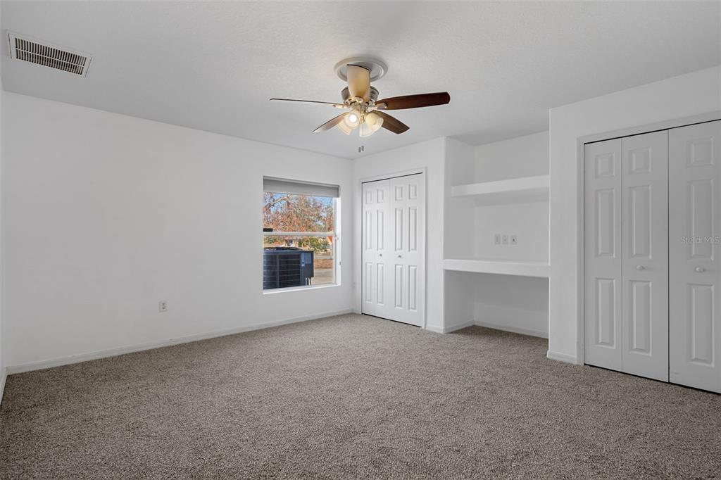 7285 Nightwalker Road Weeki Wachee, FL 34613 - Photo 47 of 79 a view of an empty room with a window