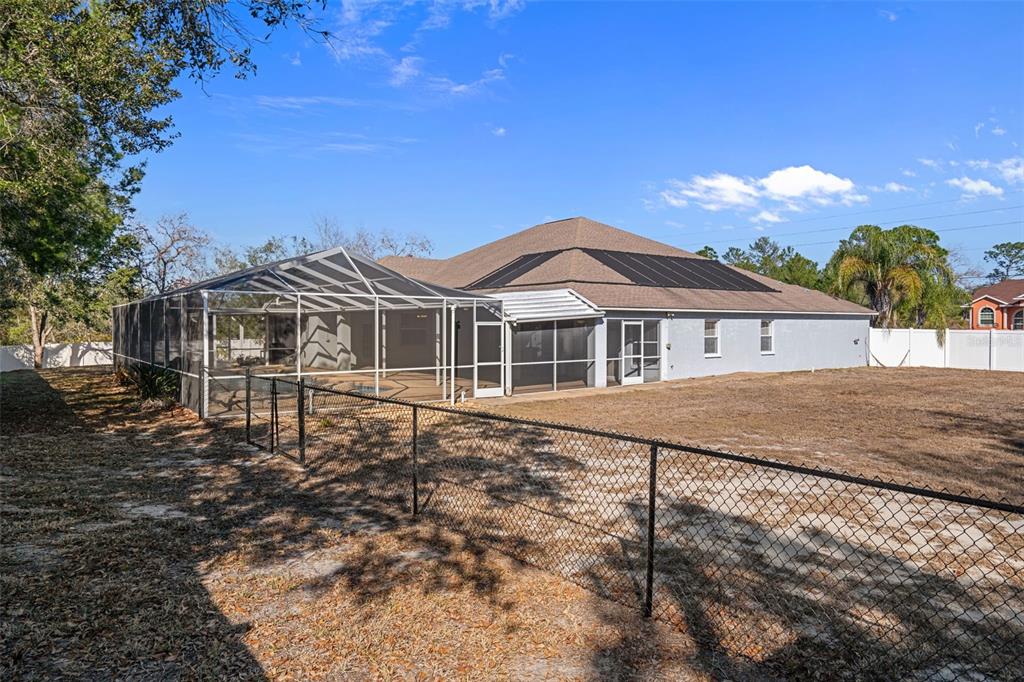 7285 Nightwalker Road Weeki Wachee, FL 34613 - Photo 72 of 79 a view of a house with a yard