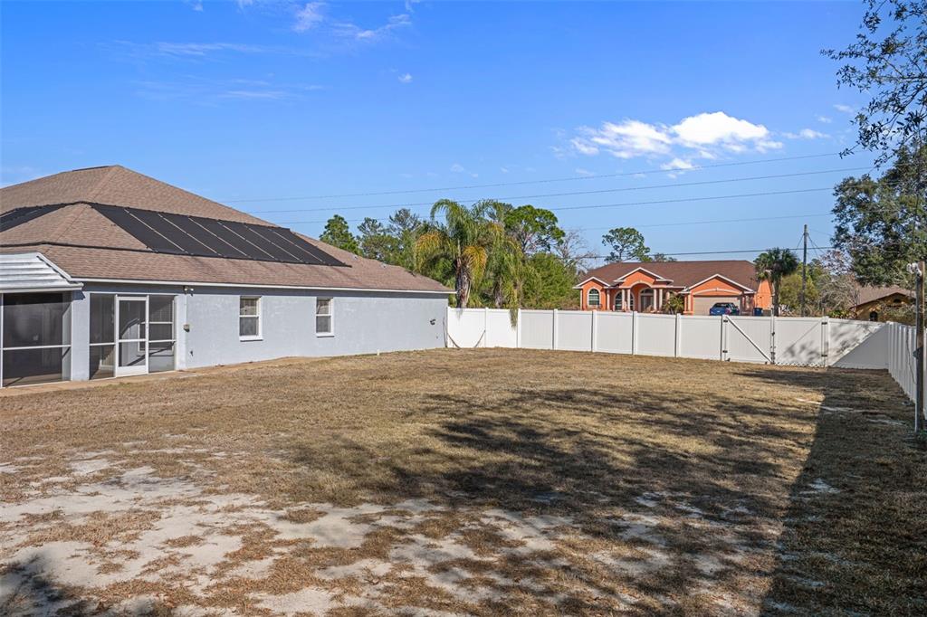 7285 Nightwalker Road Weeki Wachee, FL 34613 - Photo 73 of 79 a view of a house with a yard