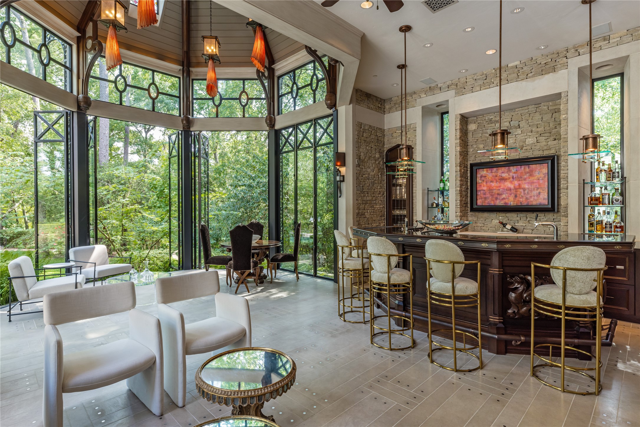 107 Timberwilde Lane Houston, TX 77024 - Photo 11 of 40 a living room with furniture a floor to ceiling windows and a flat screen tv