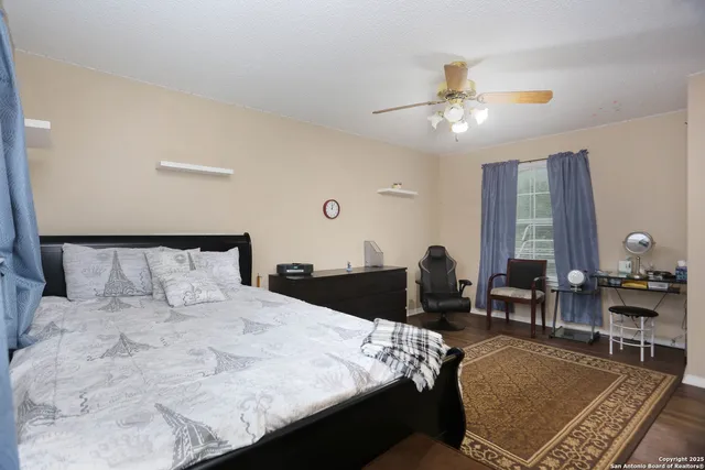 a bed room with a bed and furniture