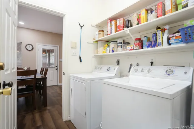 a view of kitchen center island and living room