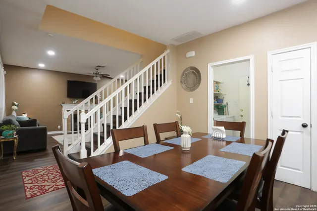 a view of a dining room with furniture