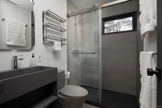 a view of staircase with large windows