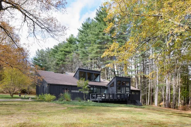 a backyard of a house with lots of lake and ocean