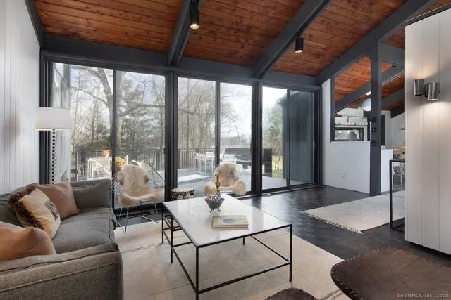 a terrace with a table and chairs