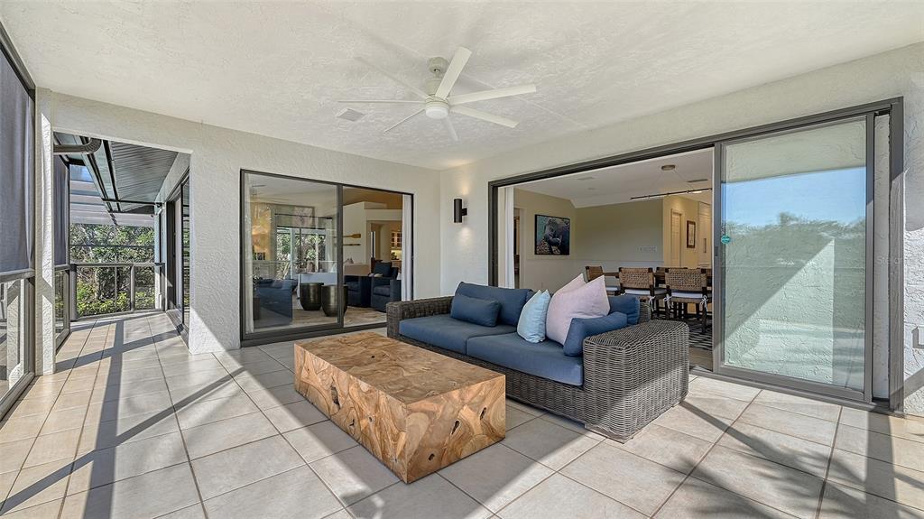 3151 Bayou Sound Longboat Key, FL 34228 - Photo 37 of 68 a living room with furniture and a large window
