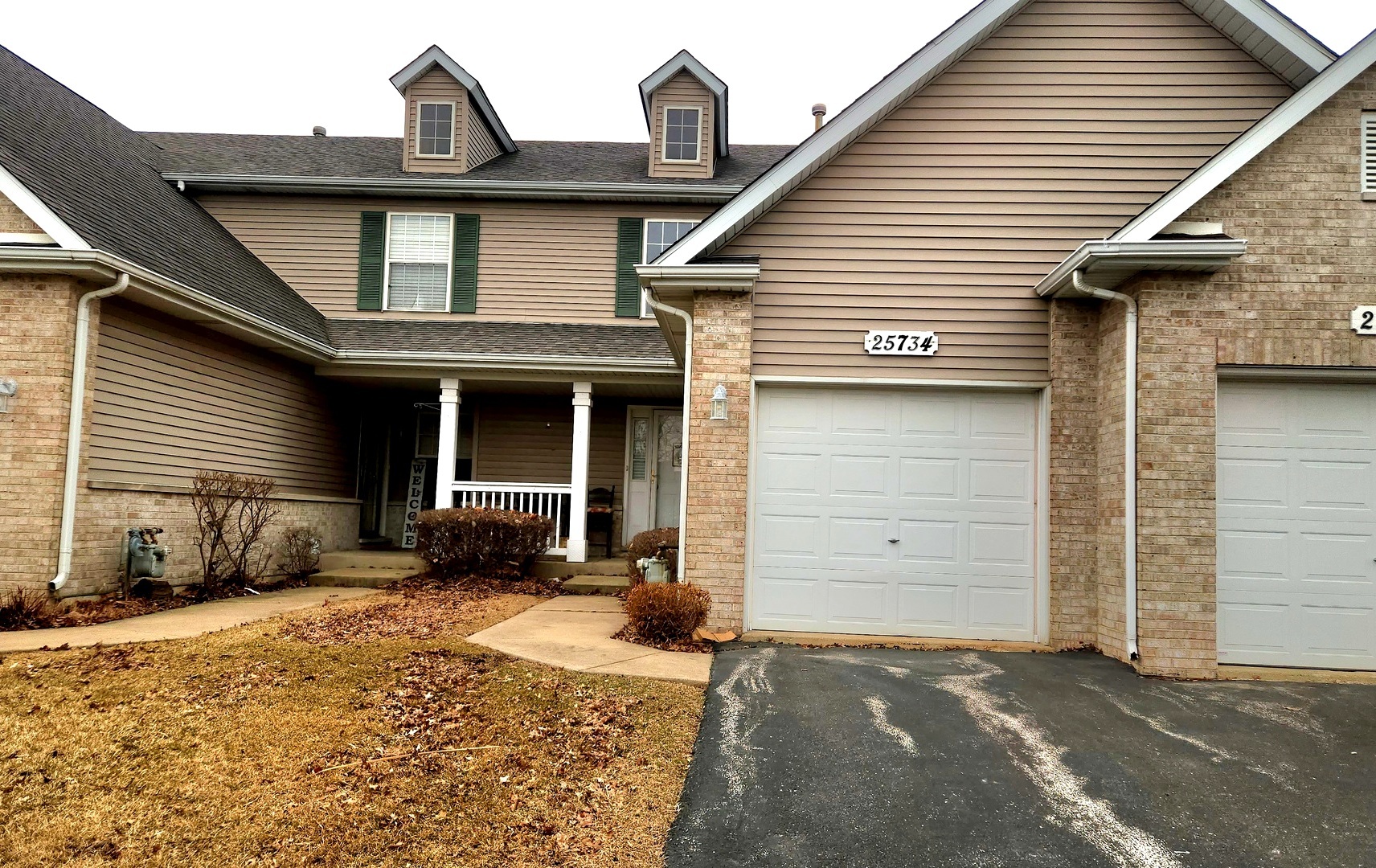 25734 Bridle Path Channahon, IL 60410 - Photo 1 of 29 a front view of a house with a yard