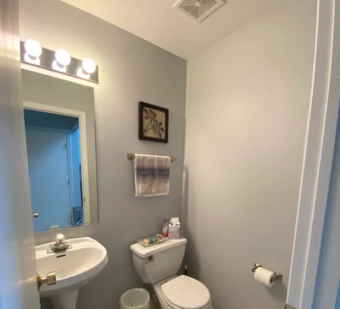 a view of hallway with furniture