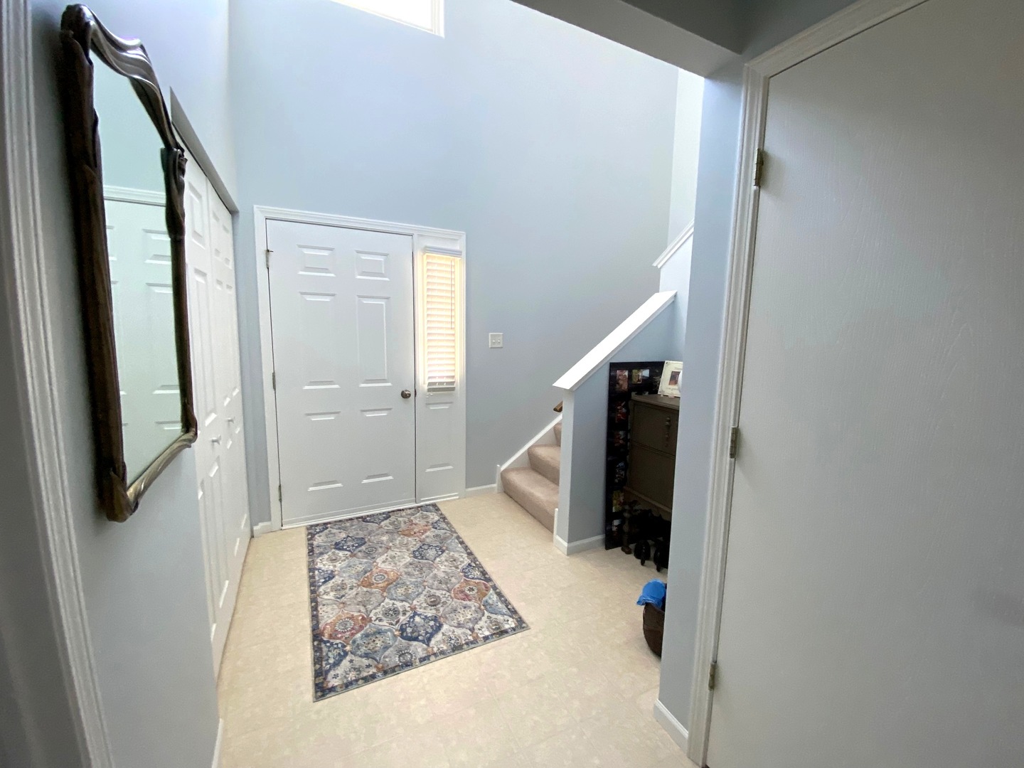 25734 Bridle Path Channahon, IL 60410 - Photo 16 of 29 a view of hallway with stairs and wooden floor