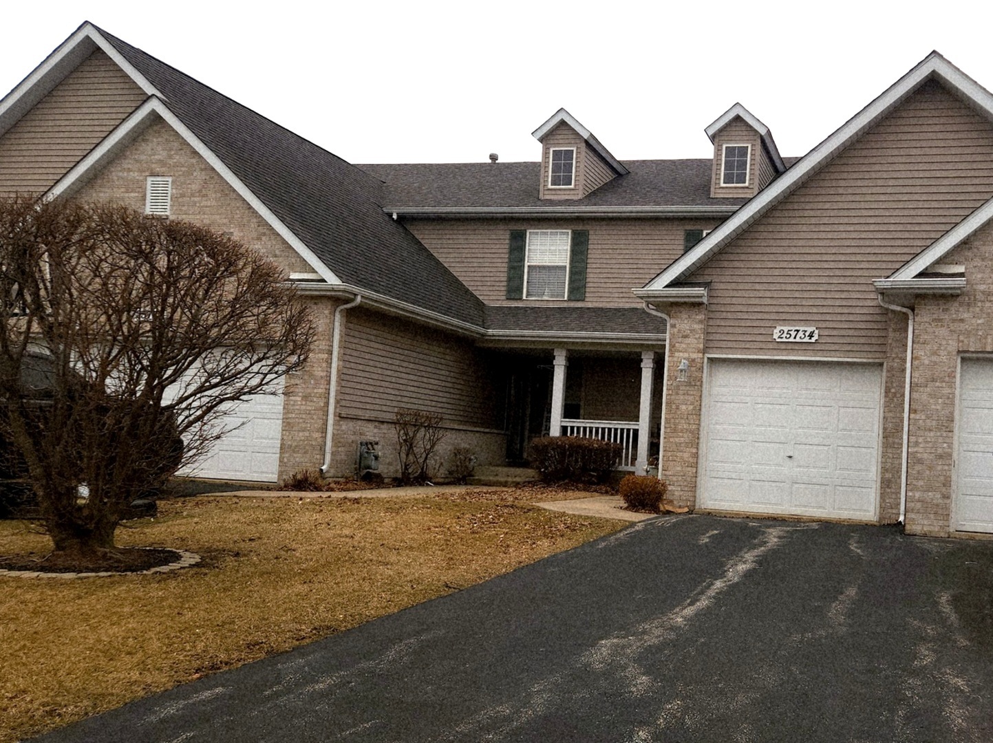 25734 Bridle Path Channahon, IL 60410 - Photo 28 of 29 a front view of a house with a yard