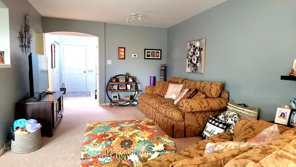 a bed room with a bed and a couch