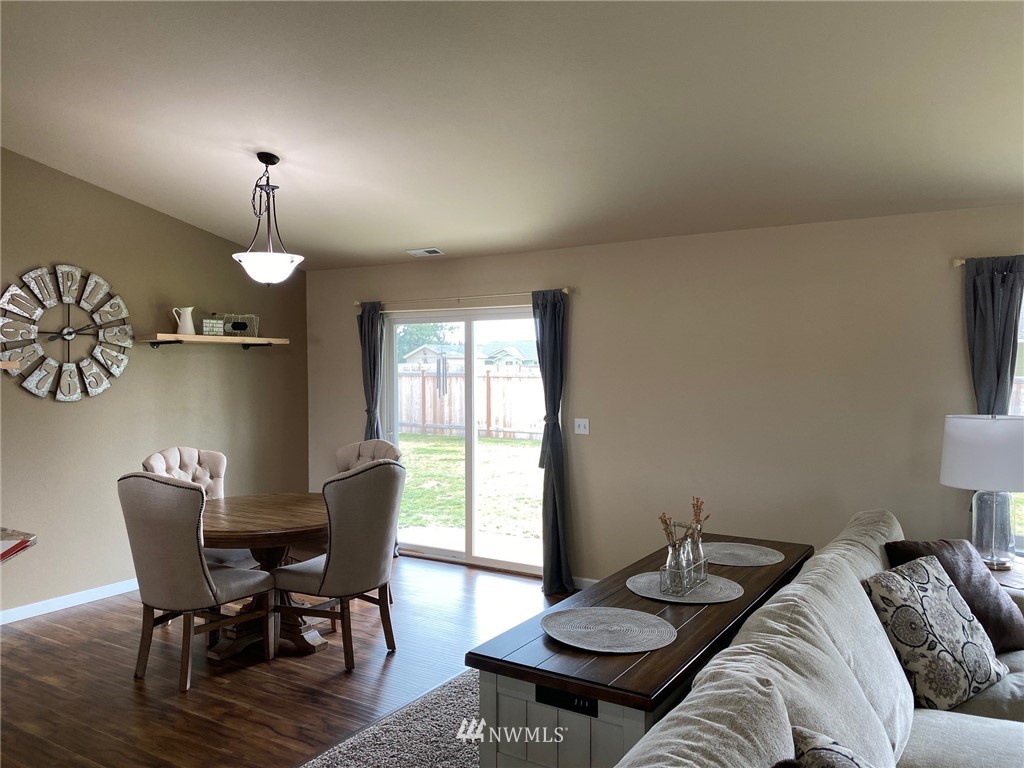 9235 179th Trail Southwest Rochester, WA 98579 - Photo 11 of 38 a view of a livingroom with furniture and a table