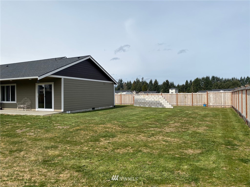 9235 179th Trail Southwest Rochester, WA 98579 - Photo 31 of 38 a view of a backyard