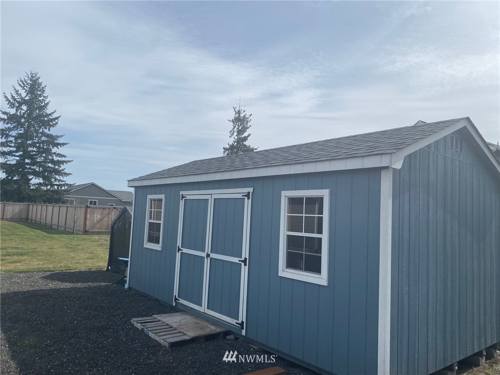 9235 179th Trail Southwest Rochester, WA 98579 - Photo 36 of 38 a front view of a house