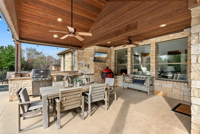 a outdoor space with lots of tables a garden and chairs