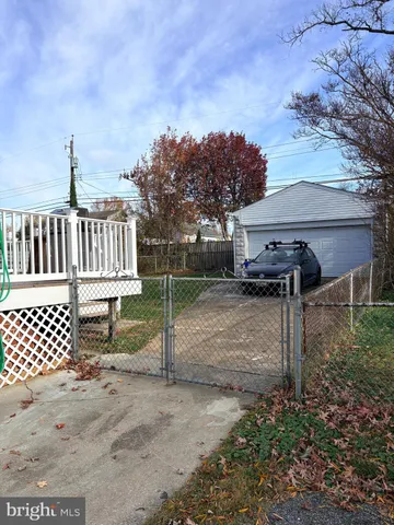 a view of a deck with a fence