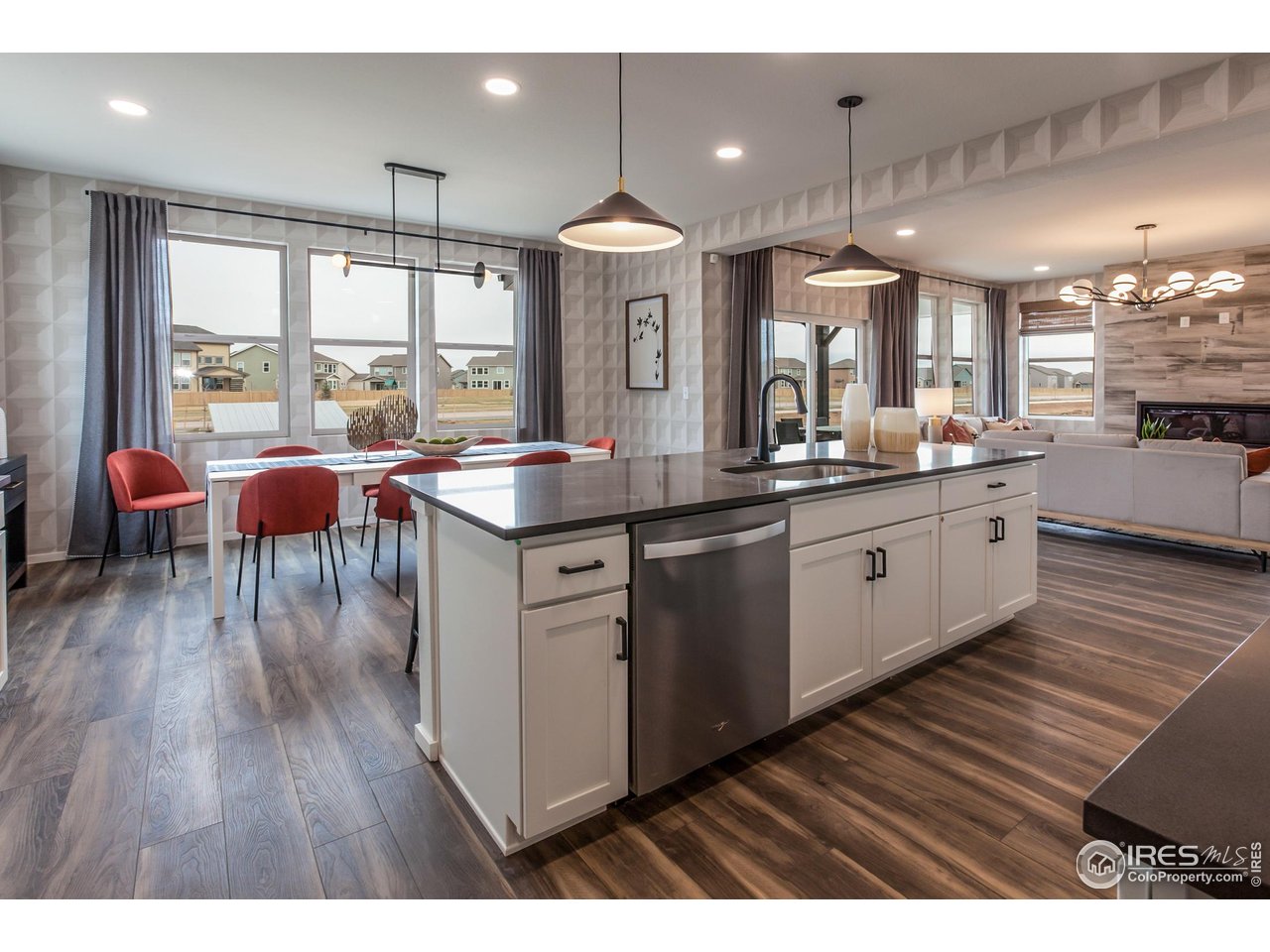 6108 Gault Road Fort Collins, CO 80528 - Photo 21 of 38 EXAMPLE PHOTO: KITCHEN ISLAND & DINING ROOM