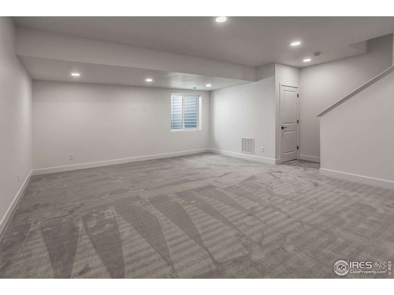 6108 Gault Road Timnath, CO 80547 - Photo 35 of 44 FINISHED BASEMENT REC ROOM