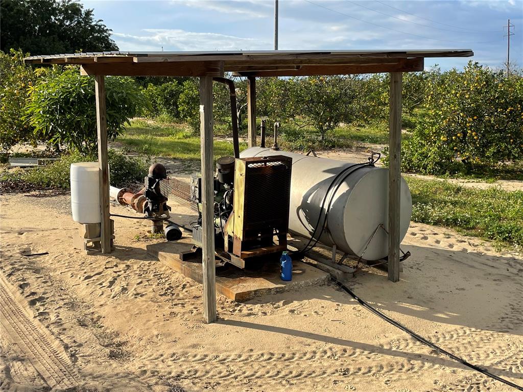 Lawrence Stewart Road Frostproof, FL 33843 - Photo 5 of 13 a view of a workspace with wooden floor and outdoor space