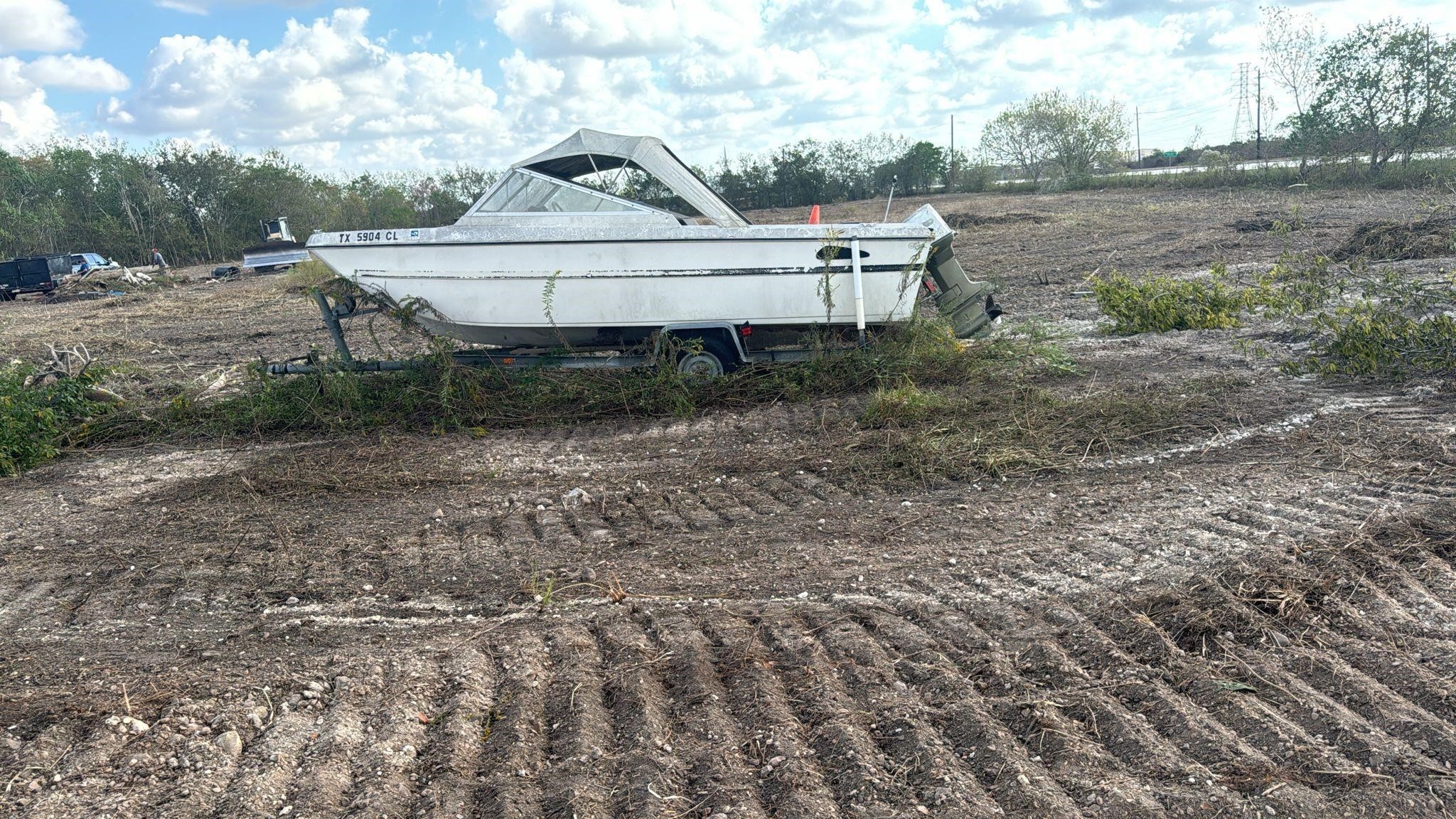 a view of a house with a yard and hanging chair