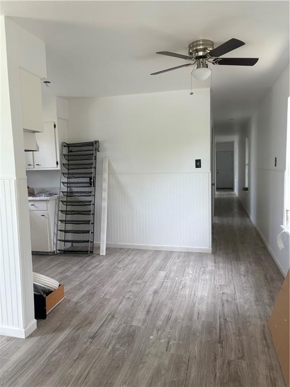 4915 Cynthia Street Corpus Christi, TX 78410 - Photo 2 of 4 a view of a room with wooden floor and a sink