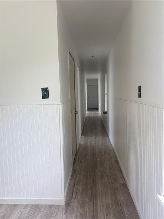 4915 Cynthia Street Corpus Christi, TX 78410 - Photo 3 of 4 a view of a hallway with wooden floor