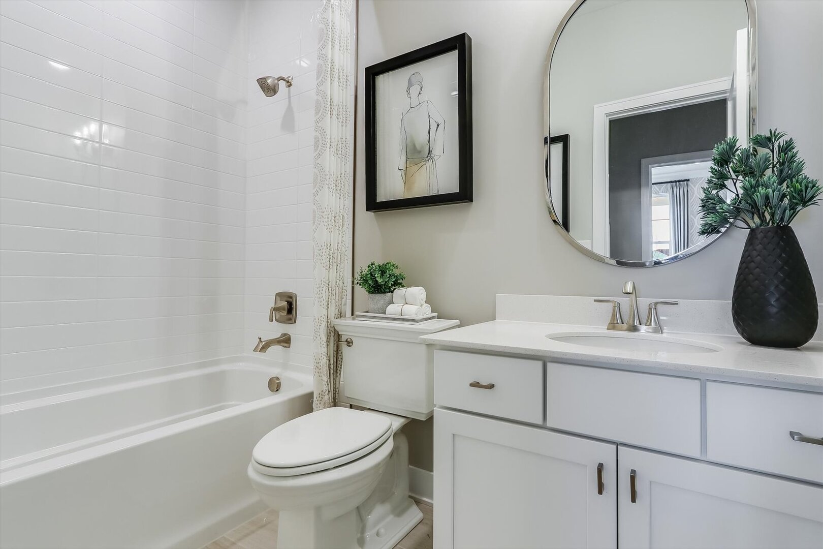 25531 West Alabaster Circle Plainfield, IL 60544 - Photo 30 of 31 a bathroom with a toilet sink and mirror